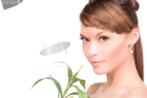 Image of woman with sprout