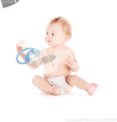 Image of baby boy with big pacifier