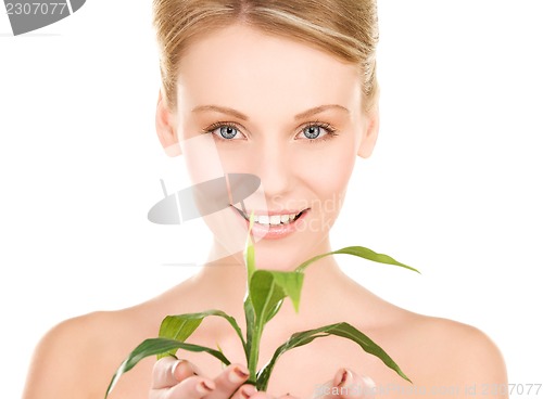 Image of woman with sprout