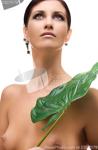 Image of woman with green leaf