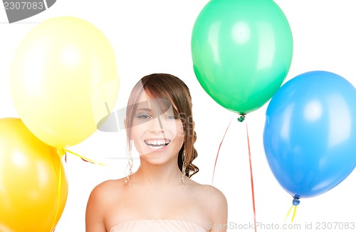 Image of happy teenage girl with balloons