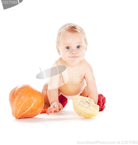 Image of baby boy with vegetables