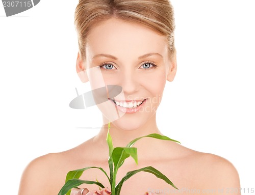 Image of woman with sprout