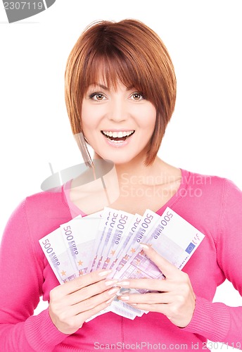 Image of happy woman with money