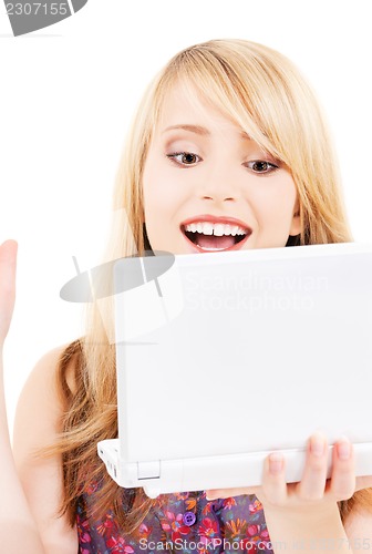 Image of teenage girl with laptop computer
