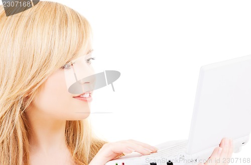 Image of teenage girl with laptop computer