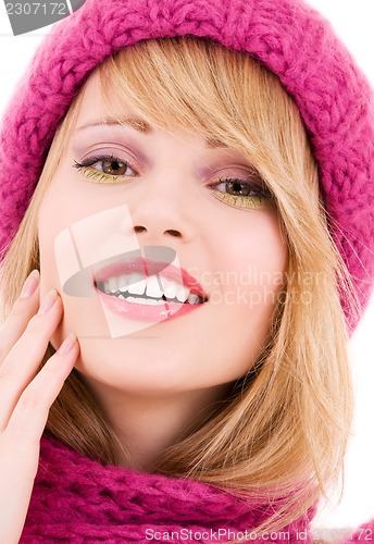 Image of happy teenage girl in hat