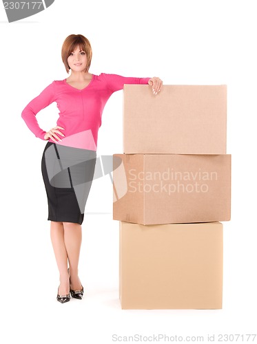 Image of businesswoman with boxes