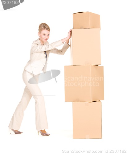 Image of businesswoman with boxes