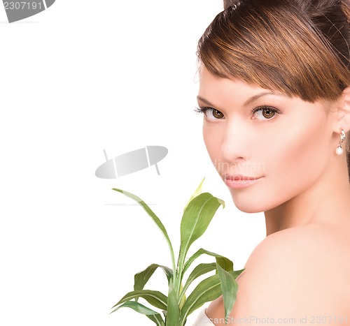 Image of woman with sprout