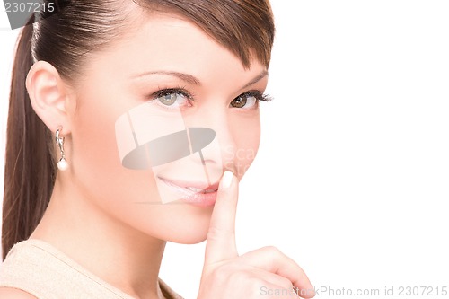 Image of finger on lips