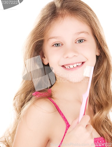 Image of happy girl with toothbrush