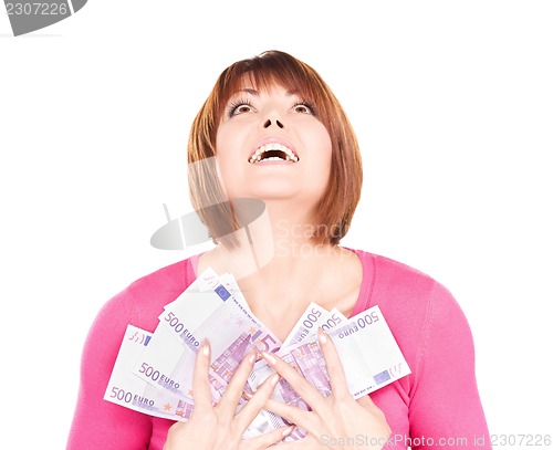 Image of happy woman with money