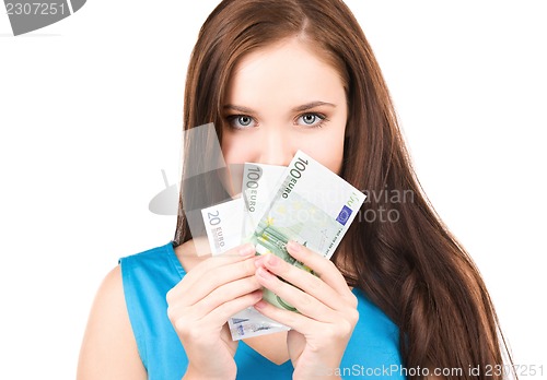 Image of lovely teenage girl with money