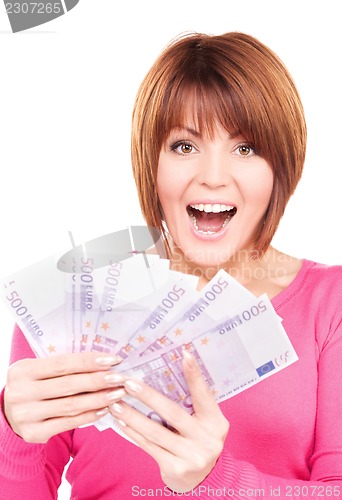 Image of happy woman with money