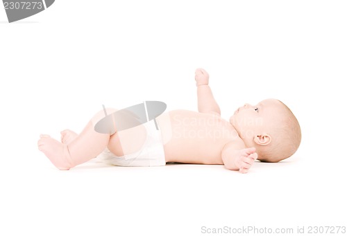 Image of laying baby boy in diaper