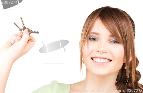 Image of happy teenage girl with keys