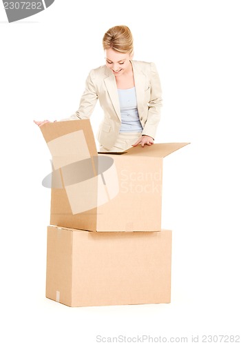 Image of businesswoman with boxes