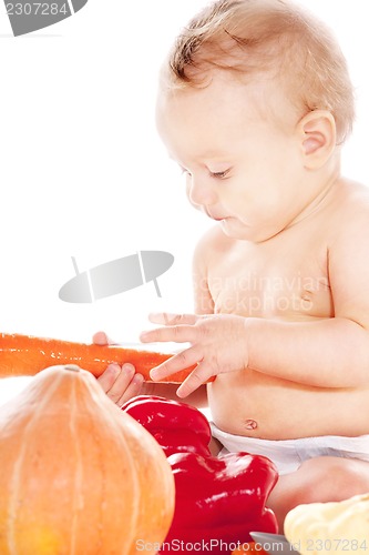 Image of baby boy with vegetables