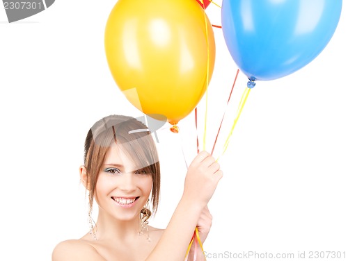 Image of happy teenage girl with balloons