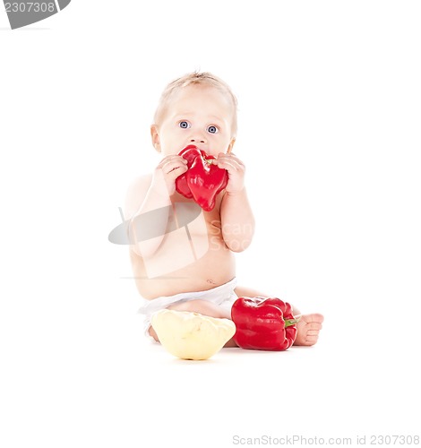 Image of baby boy with vegetables