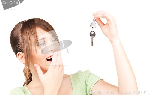 Image of happy teenage girl with keys