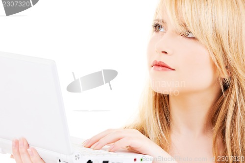 Image of teenage girl with laptop computer