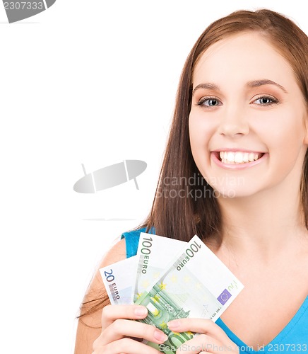 Image of lovely teenage girl with money