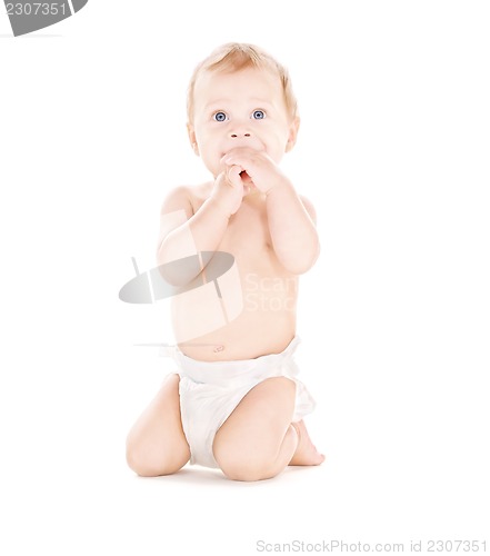 Image of sitting baby boy in diaper