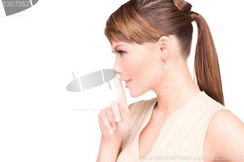 Image of finger on lips