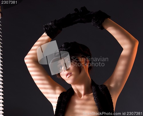 Image of woman in black astrakhan