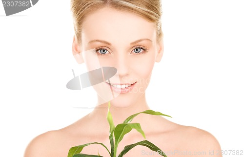 Image of woman with sprout