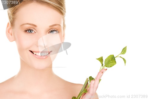 Image of woman with sprout