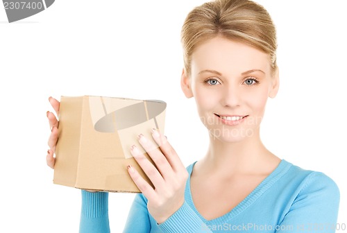 Image of businesswoman with parcel
