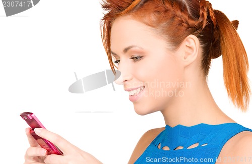 Image of happy woman with cell phone