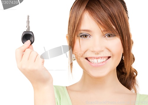 Image of happy teenage girl with car key