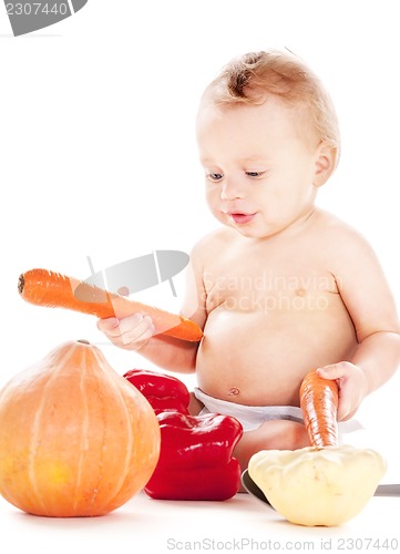 Image of baby boy with vegetables