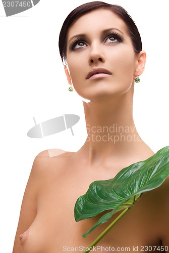 Image of woman with green leaf