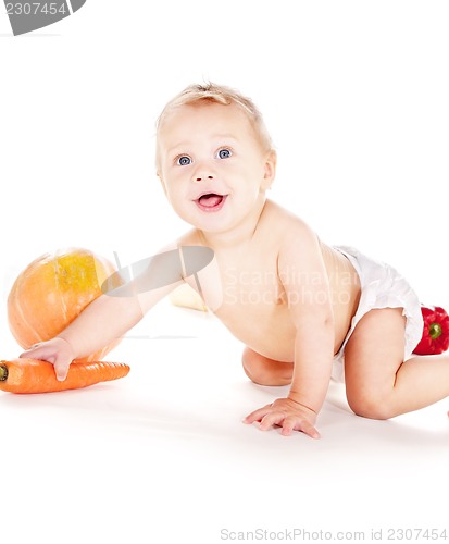 Image of baby boy with vegetables