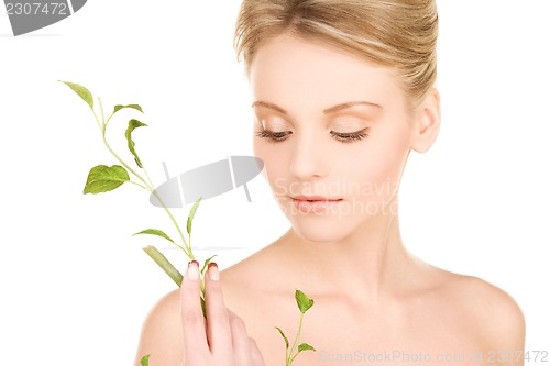 Image of woman with sprout