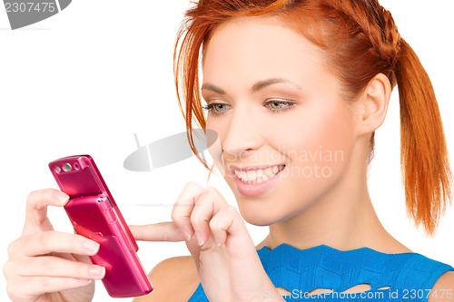 Image of happy woman with cell phone