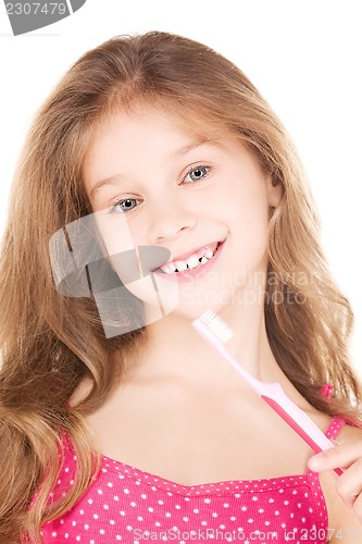 Image of happy girl with toothbrush