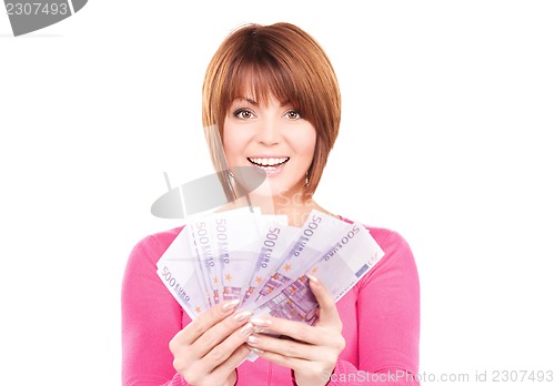 Image of happy woman with money