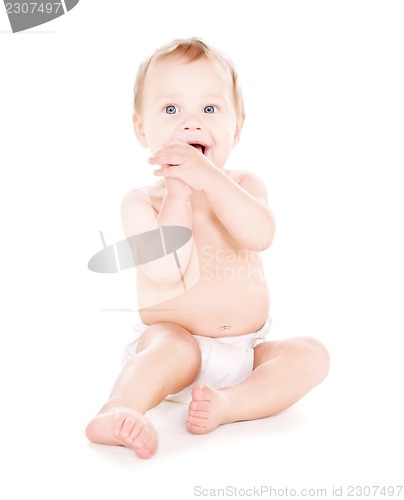 Image of sitting baby boy in diaper