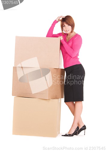 Image of businesswoman with boxes