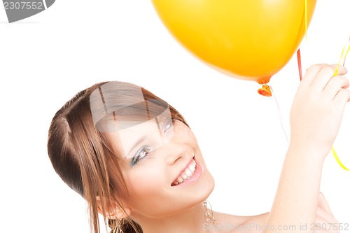 Image of happy teenage girl with balloons