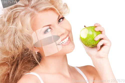 Image of young beautiful woman with green apple
