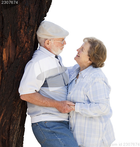 Image of Happy Senior Couple Leaning Against Tree on White