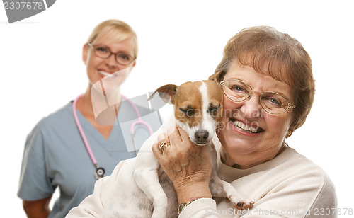 Image of Happy Senior Woman with Dog and Veterinarian