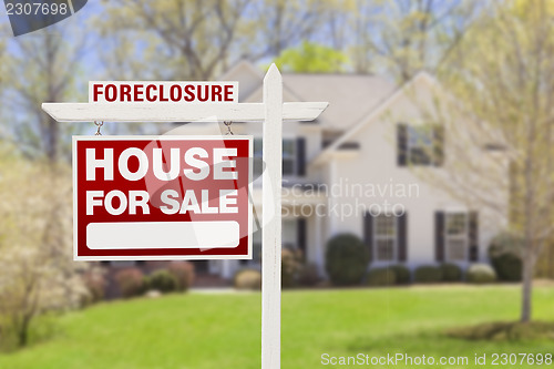 Image of Foreclosure Home For Sale Sign in Front of House